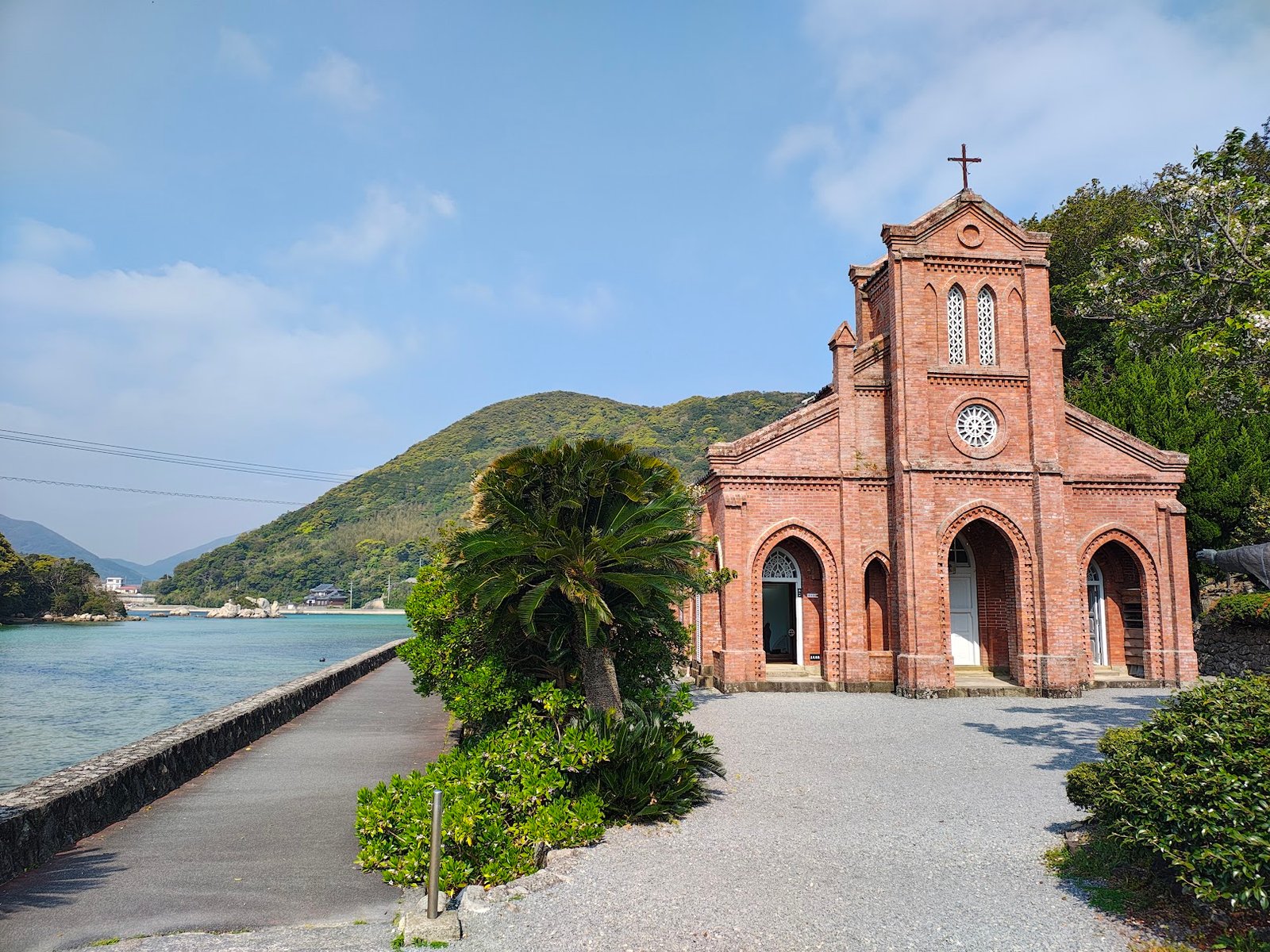 Dozaki Church beside the blue waters of Goto